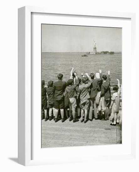 Jewish Refugee Children Waving at the Statue of Liberty from Ocean Liner, 1939-null-Framed Photo