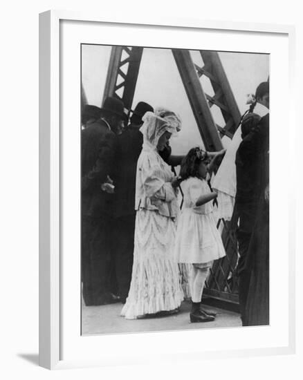 Jews Praying on the Williamsburg Bridge on Yom Kippur, Ca. 1909-null-Framed Photo