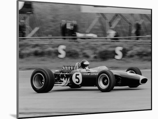 Jim Clark Driving the Lotus 49 at the British Grand Prix, Silverstone, 1967-null-Mounted Photographic Print