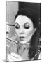 Joan Collins Applying Makeup-Associated Newspapers-Mounted Photo