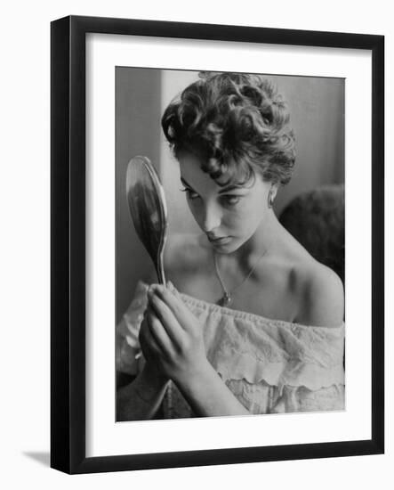 Joan Collins Studies Her Reflection-Associated Newspapers-Framed Photo