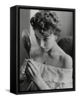 Joan Collins Studies Her Reflection-Associated Newspapers-Framed Stretched Canvas