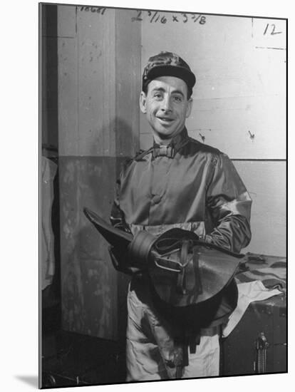Jockey Johnny Longden Smiling and Holding Saddle-Martha Holmes-Mounted Premium Photographic Print