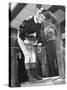 Jockey Weighing in at Race Track-Cornell Capa-Stretched Canvas