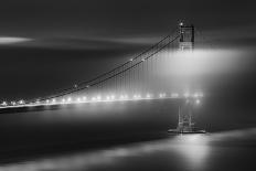 Black And White View Of The Golden Gate Bridge At Night With Silky Low Fog Around The Tower-Joe Azure-Photographic Print