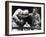 Joe Louis (Left), and Ezzard Charles, in a Heavyweight Title Bout, Sept. 27, 1950-null-Framed Photo