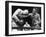 Joe Louis (Left), and Ezzard Charles, in a Heavyweight Title Bout, Sept. 27, 1950-null-Framed Photo