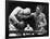 Joe Louis (Left), and Ezzard Charles, in a Heavyweight Title Bout, Sept. 27, 1950-null-Framed Photo