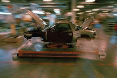 Partially Assembled Car Moving through Work Station-Joe Polimeni-Photographic Print