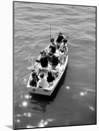 Joe Powers with Eight of His Ten Children Fishing in a Rowboat on Long Island Sound-Yale Joel-Mounted Photographic Print