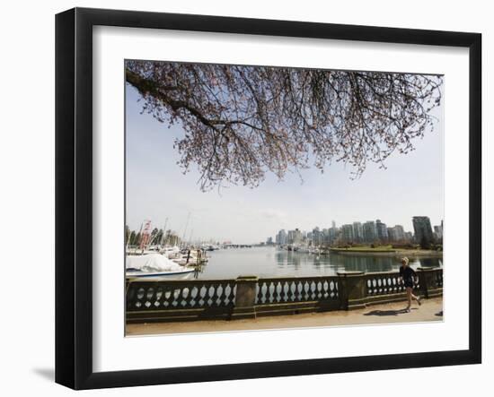 Jogger Running on the Waterfront in Coal Harbour, Vancouver, British Columbia, Canada-Christian Kober-Framed Photographic Print