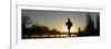 Jogger Silhouetted Against the Rising Sun as He Runs Past the Serpentine Lake in Hyde Park, London-null-Framed Photographic Print