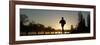 Jogger Silhouetted Against the Rising Sun as He Runs Past the Serpentine Lake in Hyde Park, London-null-Framed Photographic Print