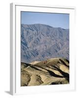 Jogging in Barren Terrain-null-Framed Photographic Print