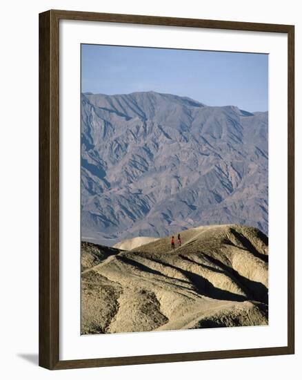 Jogging in Barren Terrain-null-Framed Photographic Print