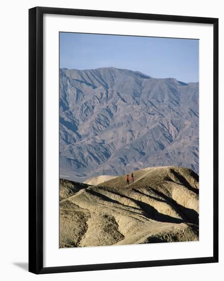 Jogging in Barren Terrain-null-Framed Photographic Print