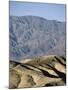 Jogging in Barren Terrain-null-Mounted Photographic Print