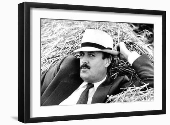 John Cleese Lounging in Hay-Associated Newspapers-Framed Photo