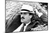 John Cleese Lounging in Hay-Associated Newspapers-Mounted Photo