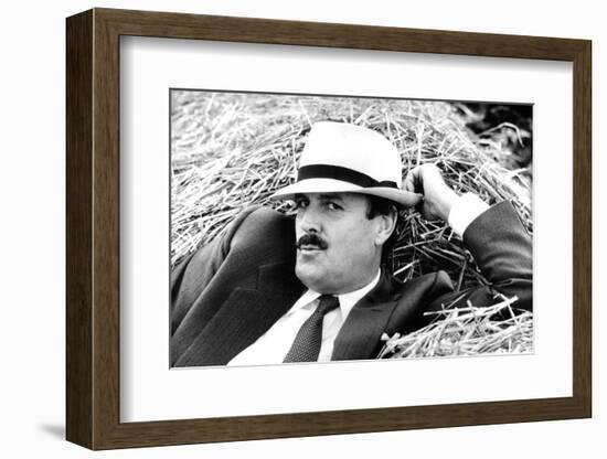 John Cleese Lounging in Hay-Associated Newspapers-Framed Photo