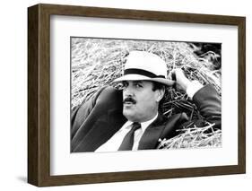 John Cleese Lounging in Hay-Associated Newspapers-Framed Photo