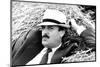 John Cleese Lounging in Hay-Associated Newspapers-Mounted Photo