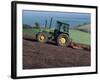 John Deere Tractor with a Rotivator on a Sloping Field in Spring, at Holcombe, Devon, England, UK-Ian Griffiths-Framed Photographic Print