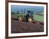 John Deere Tractor with a Rotivator on a Sloping Field in Spring, at Holcombe, Devon, England, UK-Ian Griffiths-Framed Photographic Print