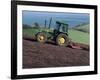 John Deere Tractor with a Rotivator on a Sloping Field in Spring, at Holcombe, Devon, England, UK-Ian Griffiths-Framed Photographic Print