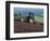 John Deere Tractor with a Rotivator on a Sloping Field in Spring, at Holcombe, Devon, England, UK-Ian Griffiths-Framed Photographic Print