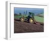 John Deere Tractor with a Rotivator on a Sloping Field in Spring, at Holcombe, Devon, England, UK-Ian Griffiths-Framed Photographic Print