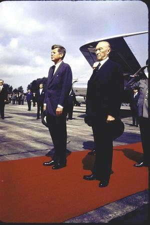 President Kennedy and Chancellor Adenauer Walking Red Carpet at Airport Arrival Ceremony, Germany