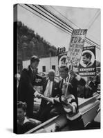 John F. Kennedy and Franklin D. Roosevelt Jr. Shaking Hands with Boy During Parade-Hank Walker-Stretched Canvas