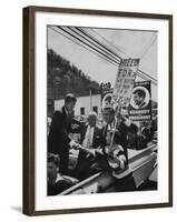 John F. Kennedy and Franklin D. Roosevelt Jr. Shaking Hands with Boy During Parade-Hank Walker-Framed Photographic Print