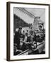 John F. Kennedy and Franklin D. Roosevelt Jr. Shaking Hands with Boy During Parade-Hank Walker-Framed Photographic Print