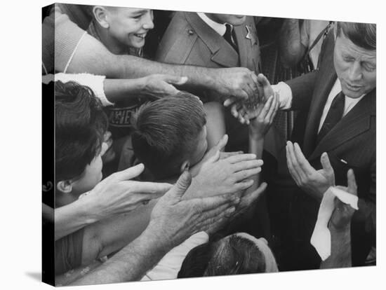 John F. Kennedy During His Campaign Tour-null-Stretched Canvas