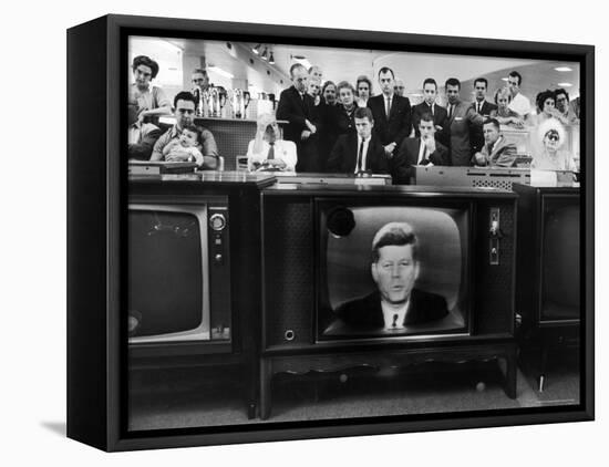 John F. Kennedy's TV Announcement of Cuban Blockade During the Missile Crisis in a Department Store-Ralph Crane-Framed Stretched Canvas