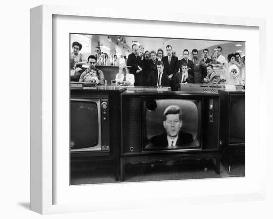John F. Kennedy's TV Announcement of Cuban Blockade During the Missile Crisis in a Department Store-Ralph Crane-Framed Photographic Print