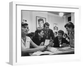 John F. Kennedy with Brother and Sisters Working on His Senate Campaign-Yale Joel-Framed Photographic Print