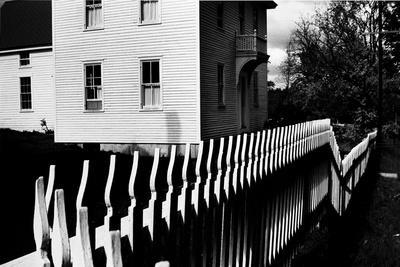 Wooden Picket Fence Surrounding a Building Built in 1850 in a Shaker Community