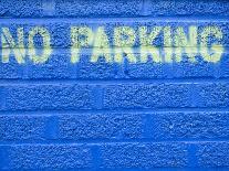 Painted Blue Brick Wall with No Parking Sign-John Nordell-Photographic Print
