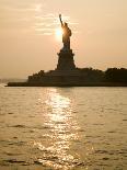 Sun Setting Behind the Statue of Liberty on a Summer Evening-John Nordell-Photographic Print