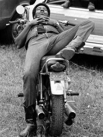 African American Man Relaxing on His Motocycle During Motorcycle Races near Detroit, Michigan
