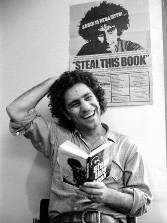 Yippie Leader Abbie Hoffman Holding Copy of His Book