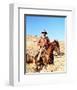 John Wayne on horse in mountains-Movie Star News-Framed Photo