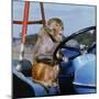 Johnny Rhesus Driving Tractor-null-Mounted Photographic Print
