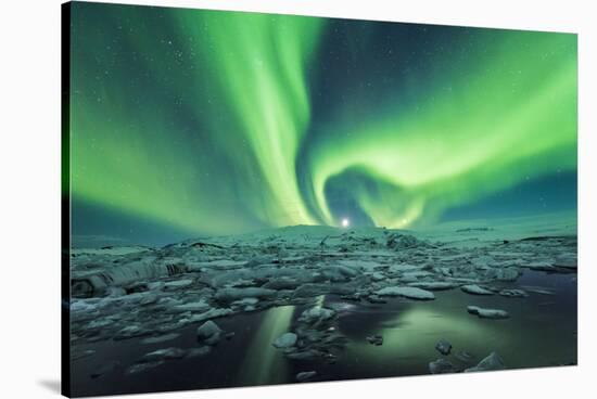 Jokulsarlon, East Iceland, Iceland. Northern lights over the glacier lagoon.-Marco Bottigelli-Stretched Canvas