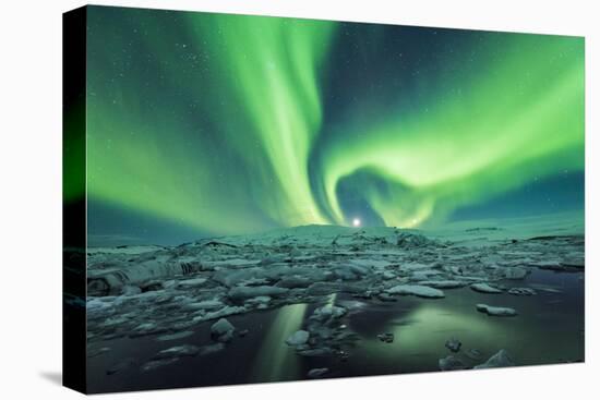 Jokulsarlon, East Iceland, Iceland. Northern lights over the glacier lagoon.-Marco Bottigelli-Stretched Canvas