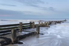Incoming waves hitting a groyne at Walcott, Norfolk, England, United Kingdom, Europe-Jon Gibbs-Photographic Print