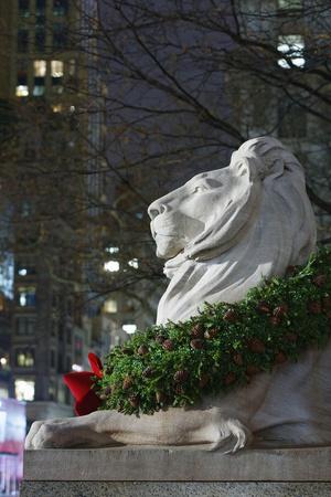 New York Public Library Lion Decorated with a Christmas Wreath during the Holidays.